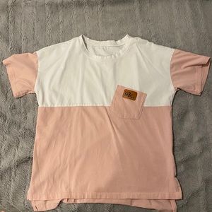 a white and pink tee shirt